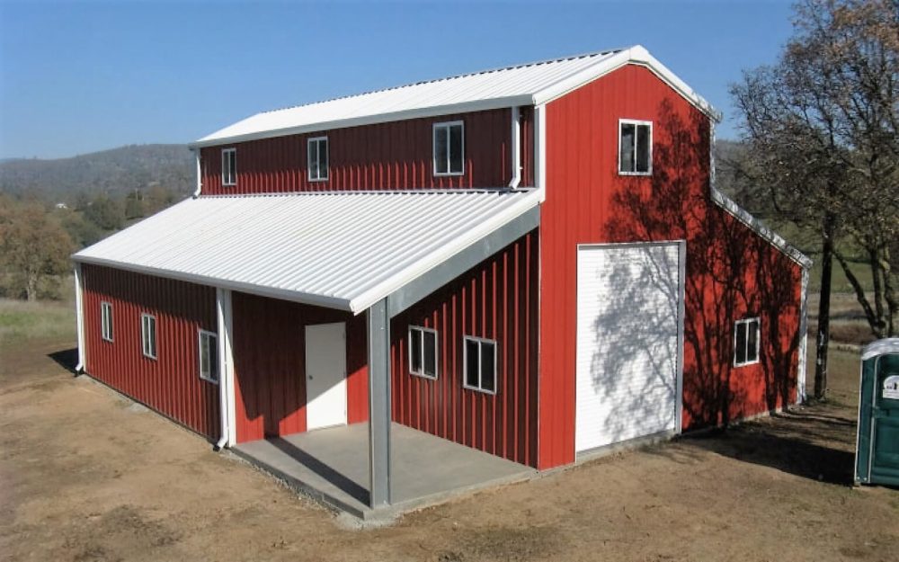 A red and white  metal building homes 