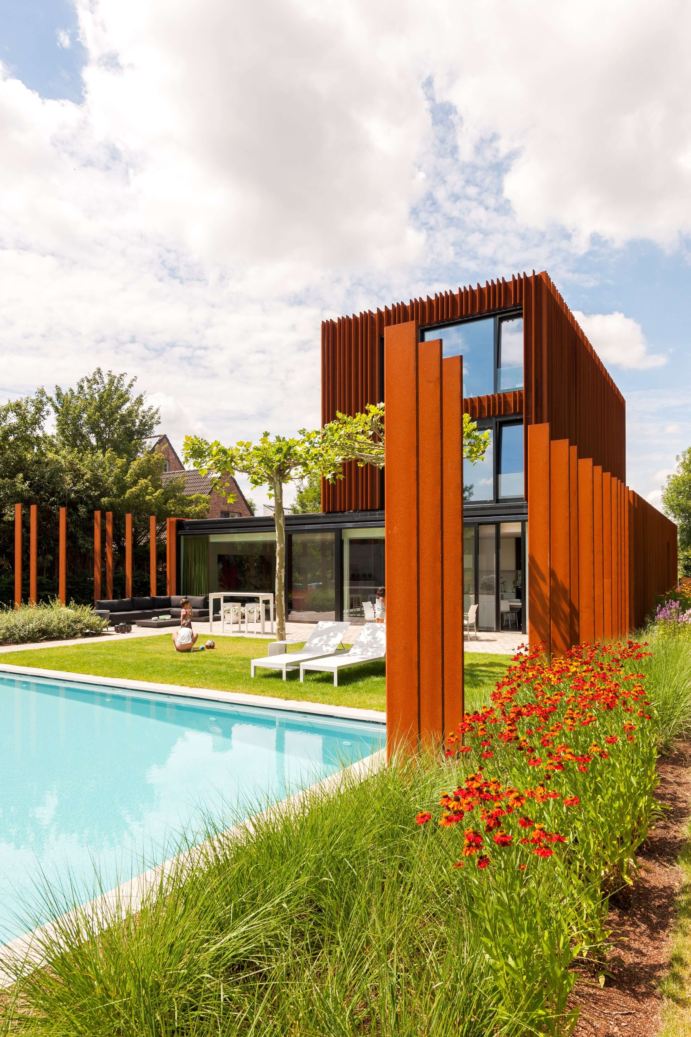 Corten House Outside Space With Pool And Small Garden