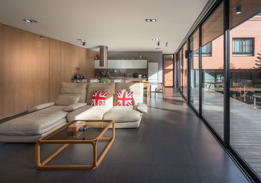  U38 House living room with furniture and a large window 