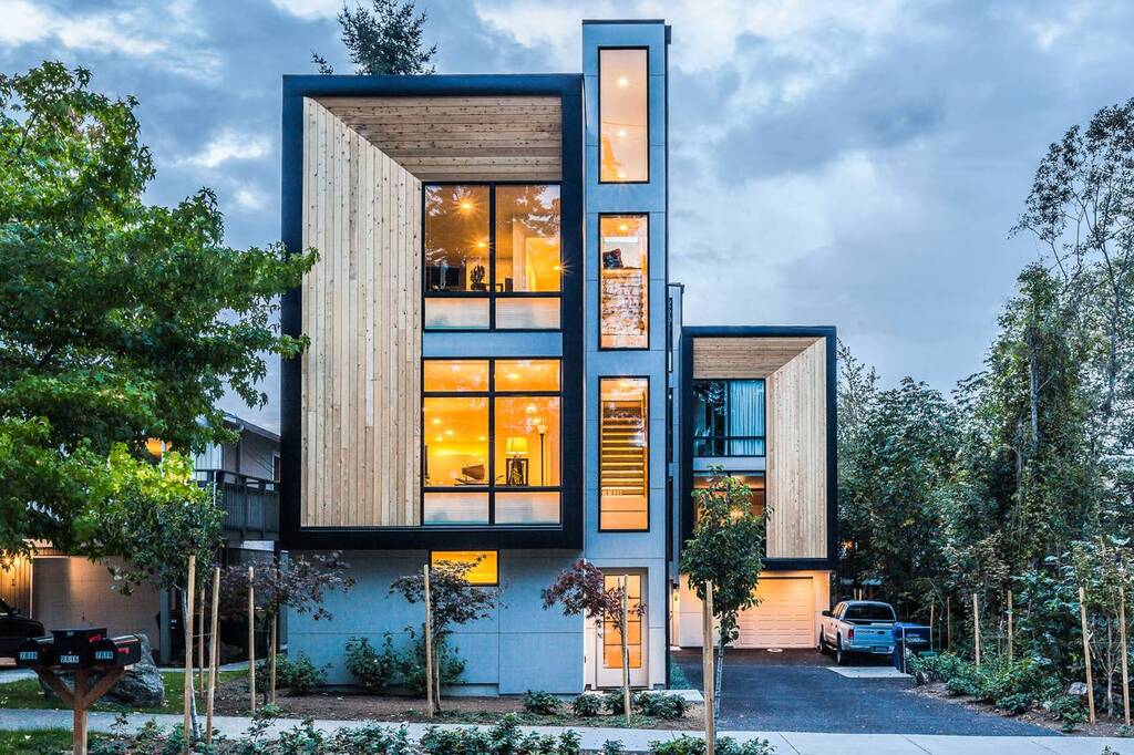 A modern house with a lot of windows
