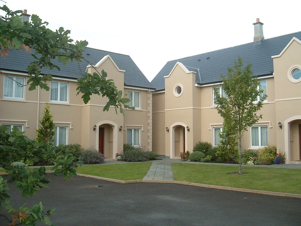 A couple of houses that are next to each other
