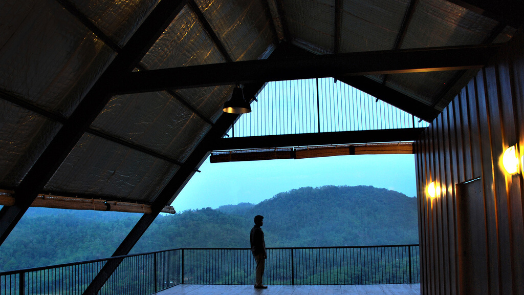 person standing on a balcony of Estate Bungalow, Sri Lanka