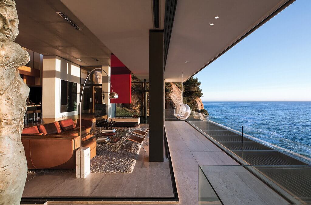 ARRCC presents Horizon Villa living room with a view of the ocean
