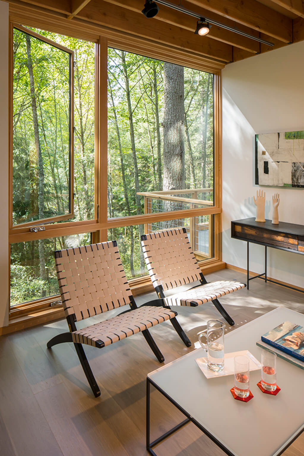 Little House Big Shed living room with two chairs and a coffee table 