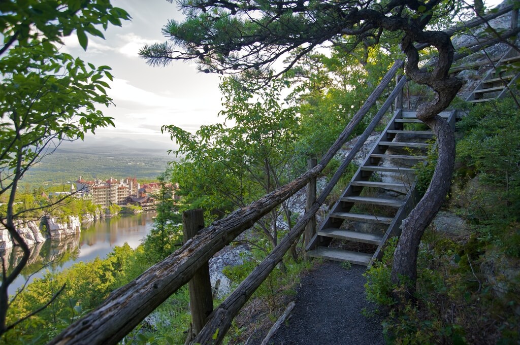 A set of stairs leading up to the top of a hill
