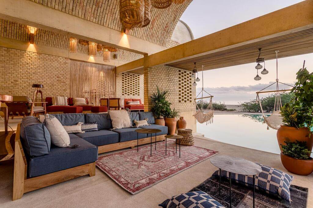 Casona Sforza  living room with furniture next to a pool
