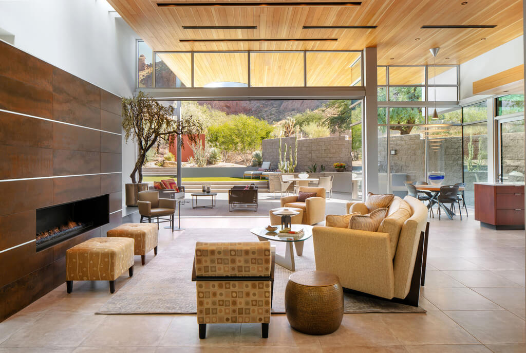 Echo Canyon Residence living room with furniture and a fire place 