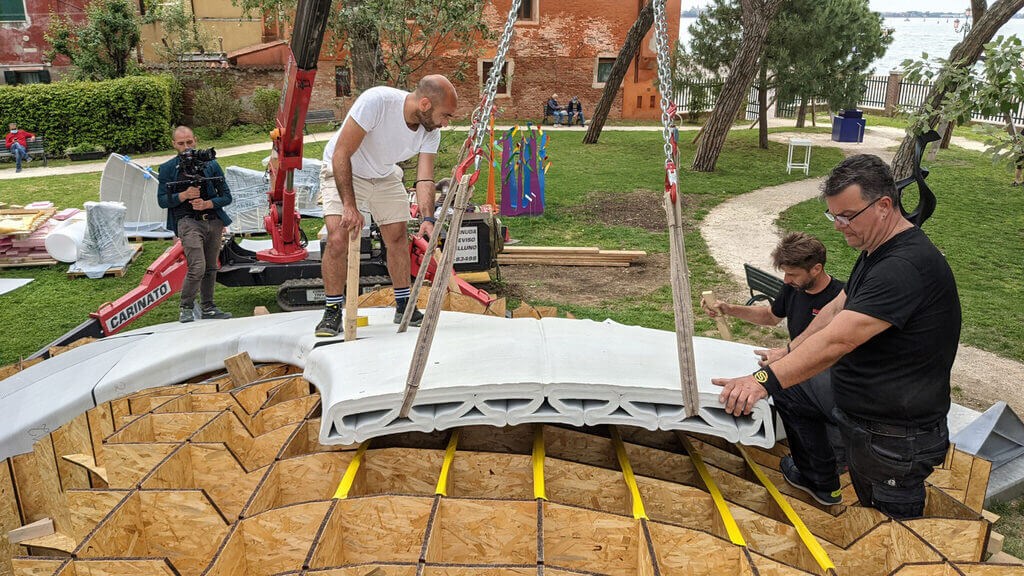 f men working on a Striatus Bridge