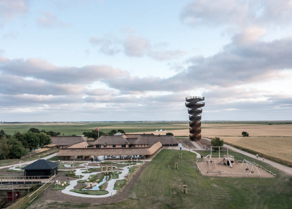 An aerial view of a building with
marsk tower by bjarke ingels group's