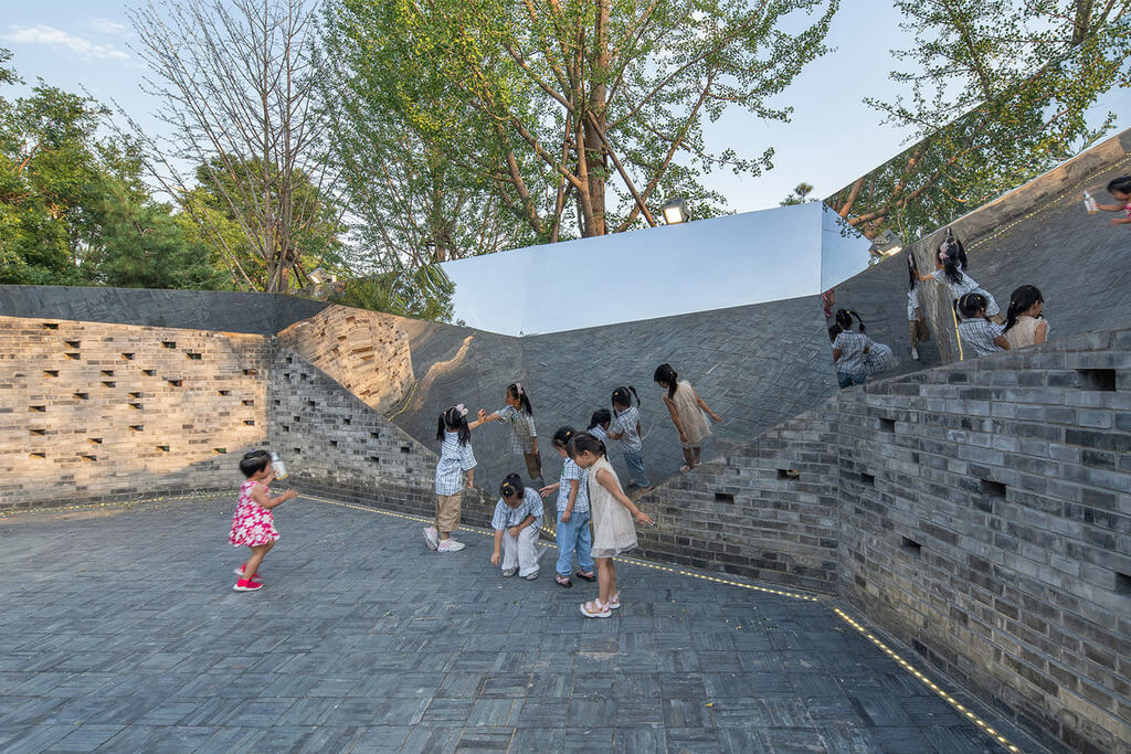 kids play in songzhuang micro community park by crossboundaries