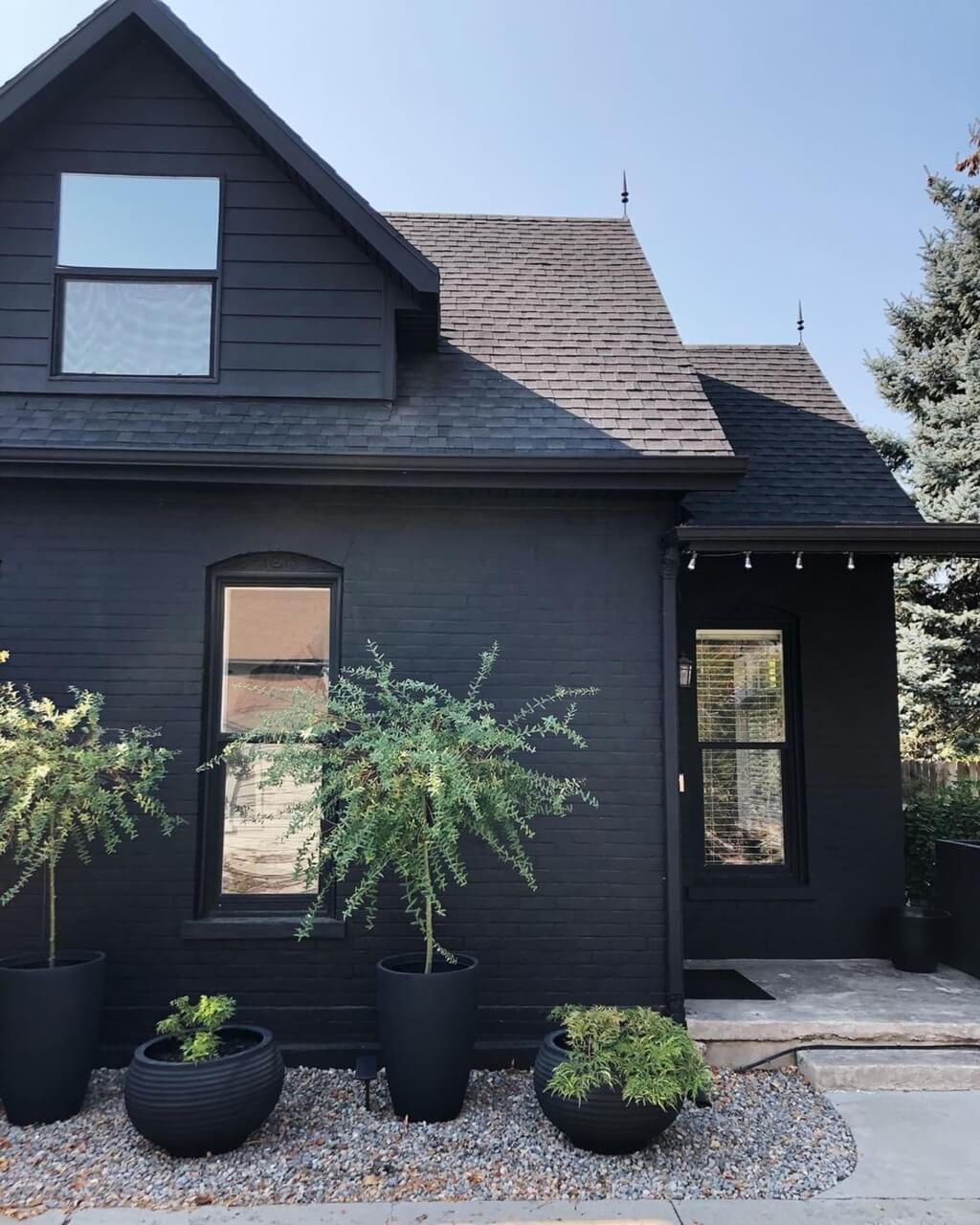 Black Brick House With Black Roof