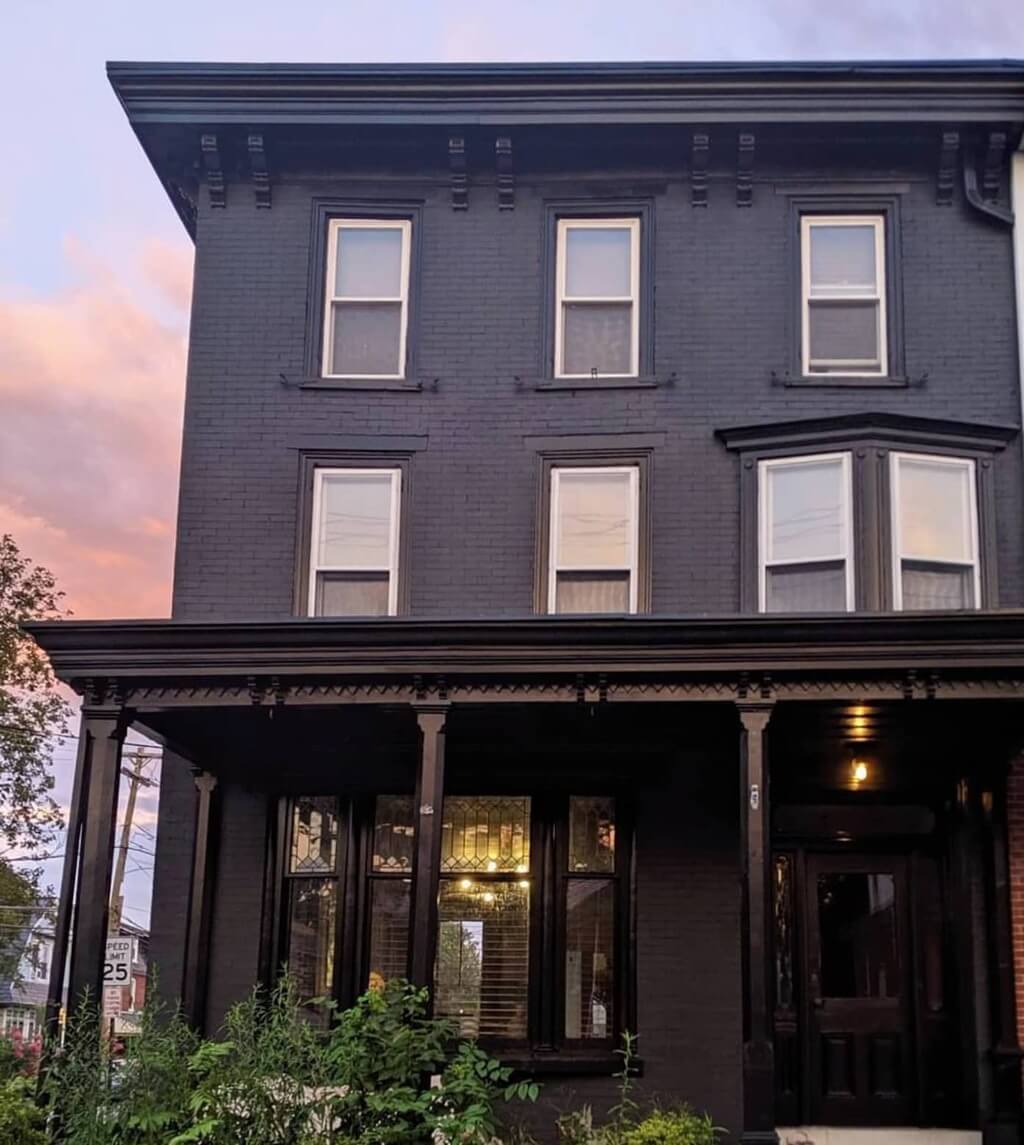 A Black Victorian Brick Mansion