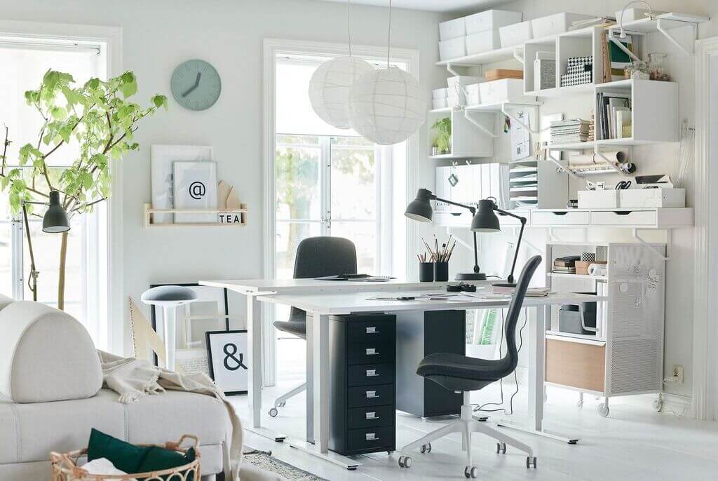 A White Office room with a desk and a chair
