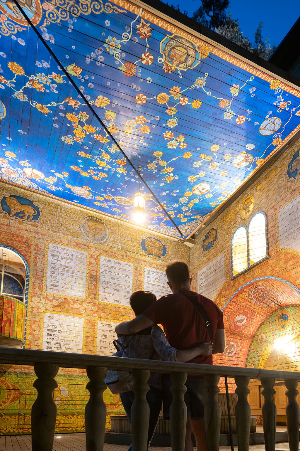 A couple of people that are standing in front of Babyn Yar Synagogue