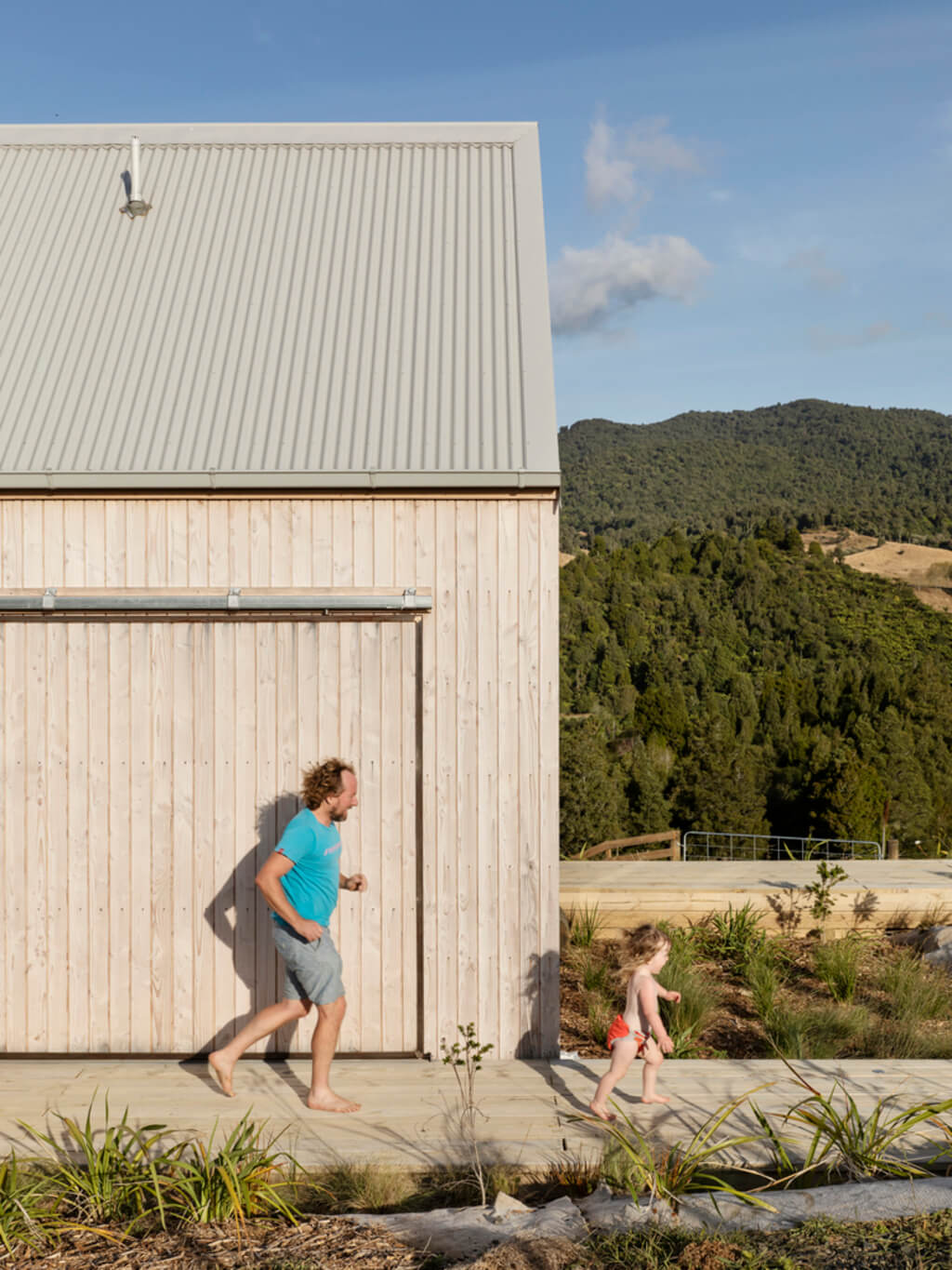 a men and kids running