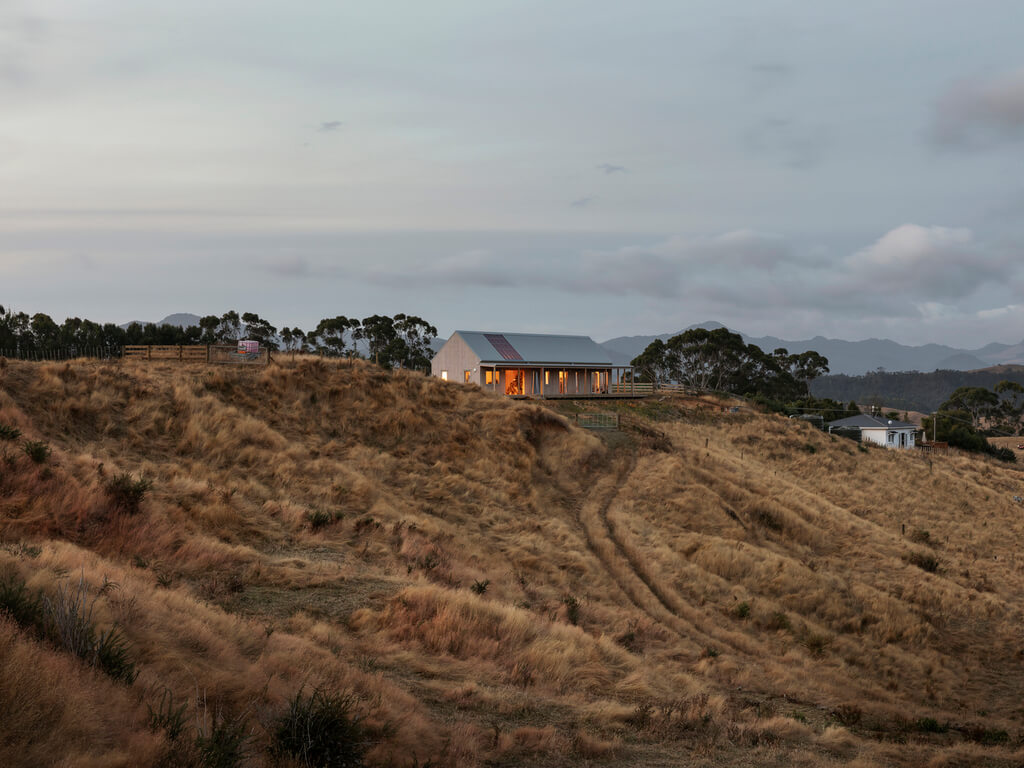 Karangahake House and  a ground full of dry grass