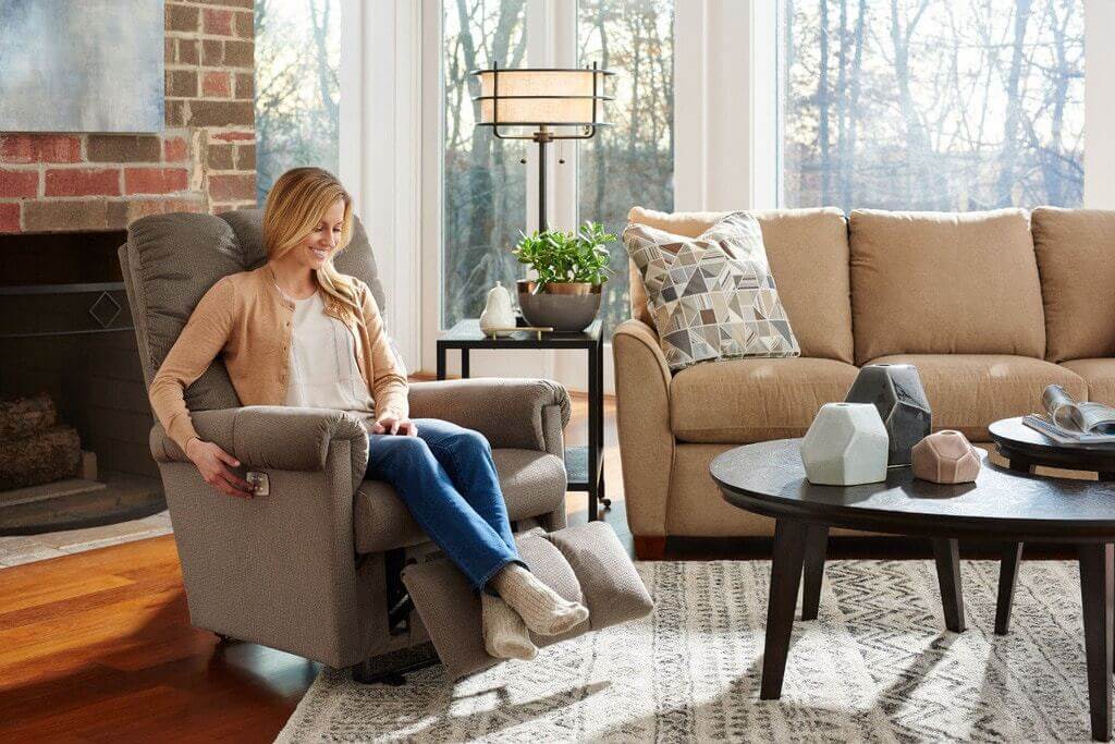 women adjust recliner sofa 