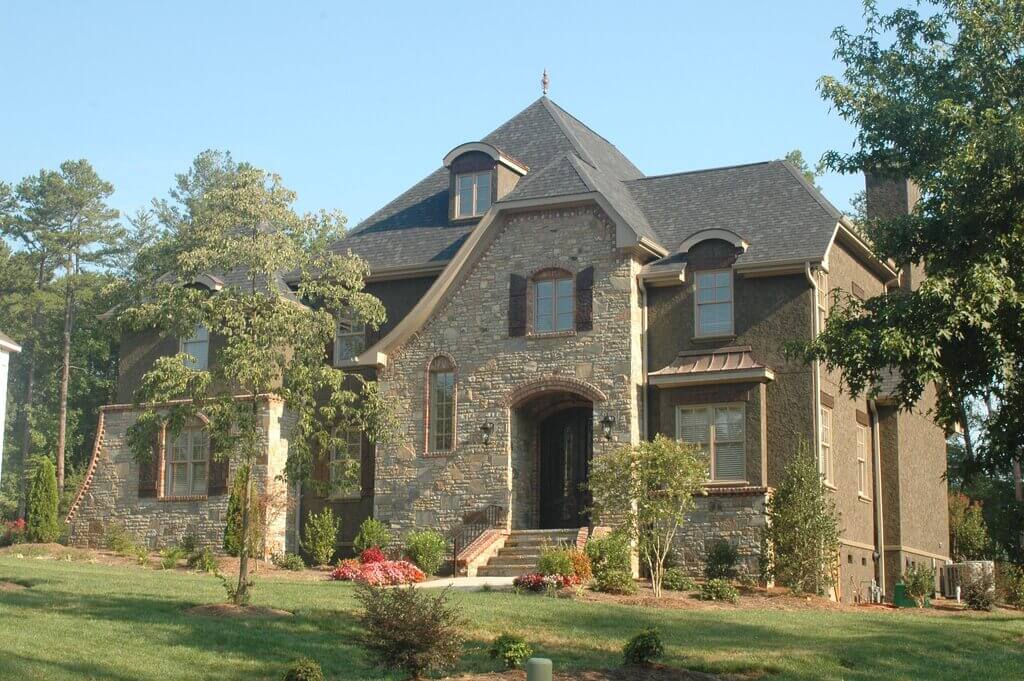 Classic Brown Three-story House board and batten siding