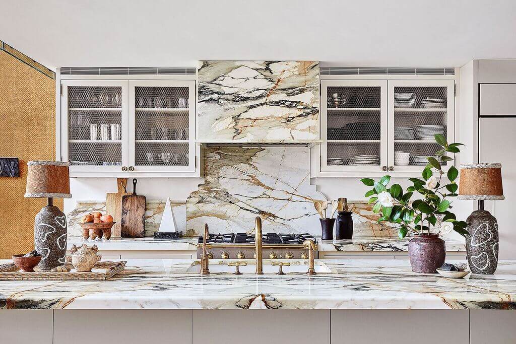 Kitchen with marble counter top and sink