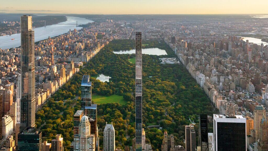 An aerial view of a city and a lake