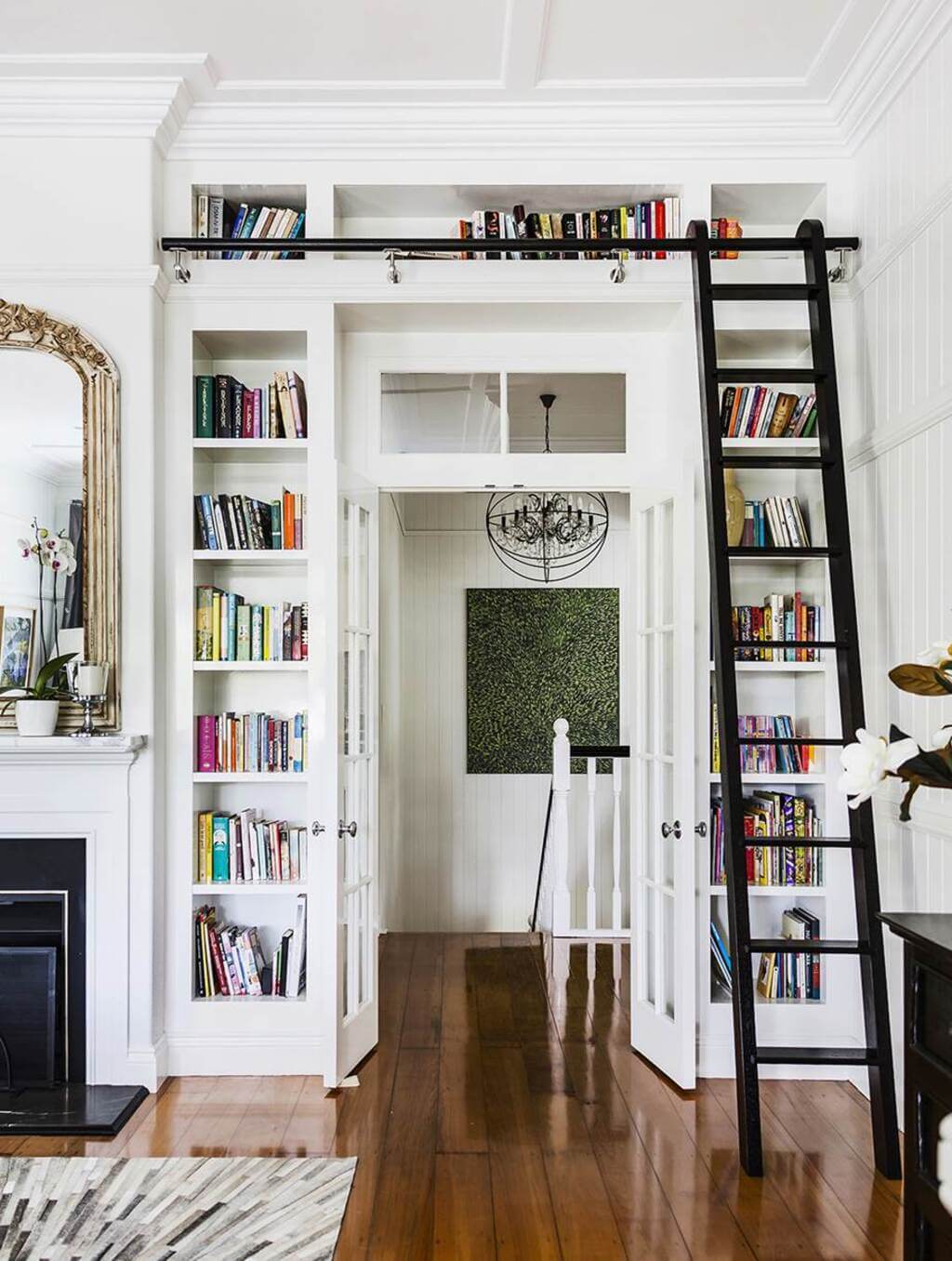 A Resort Style Queenslander House iving room bookshelf 