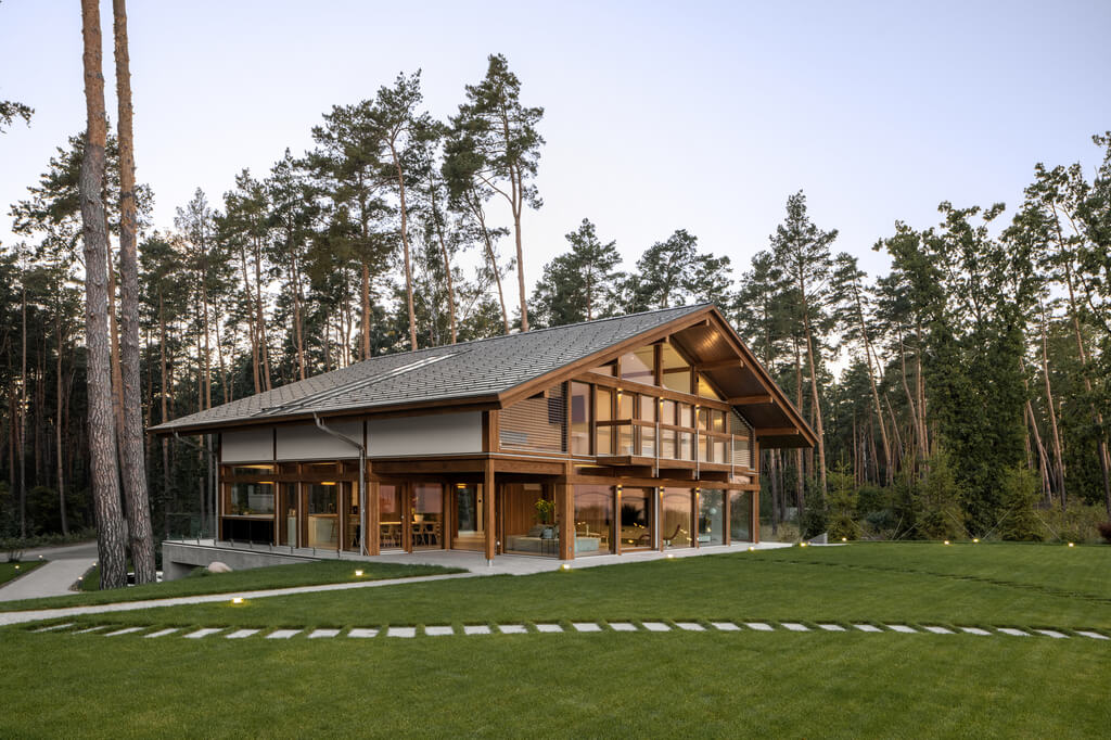 large chalet house middle in the forest