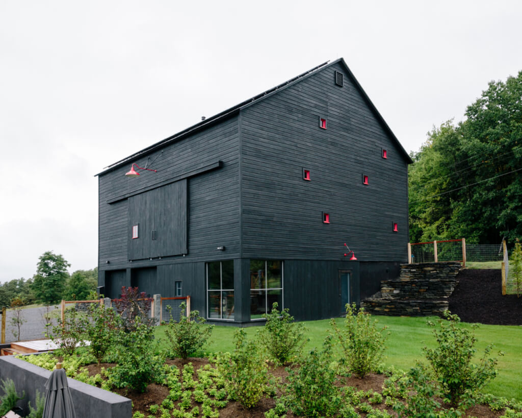 black exterior barn style house 