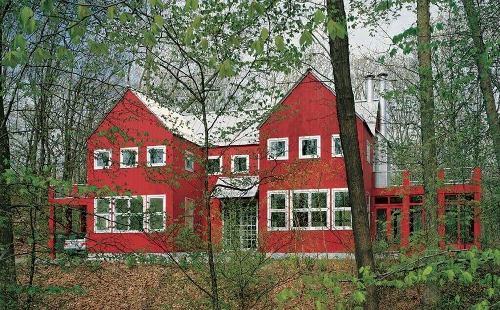 red color exterior barn style home