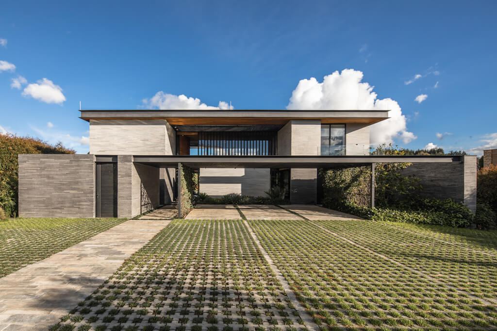 B33 house  with a grassy yard and a walkway