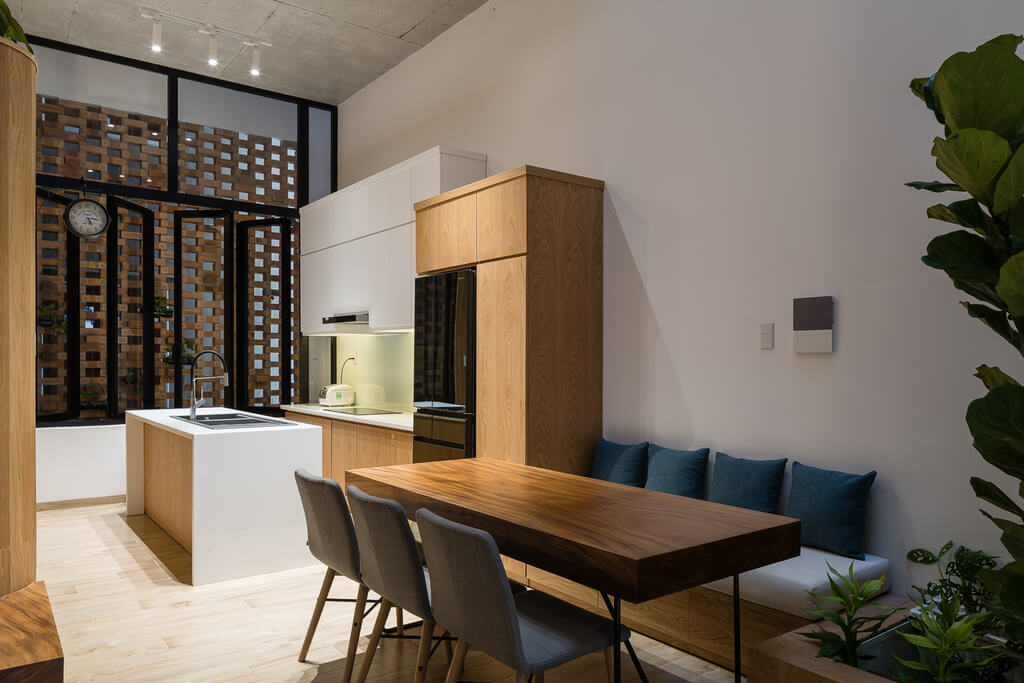 H house kitchen with a wooden table and chairs
