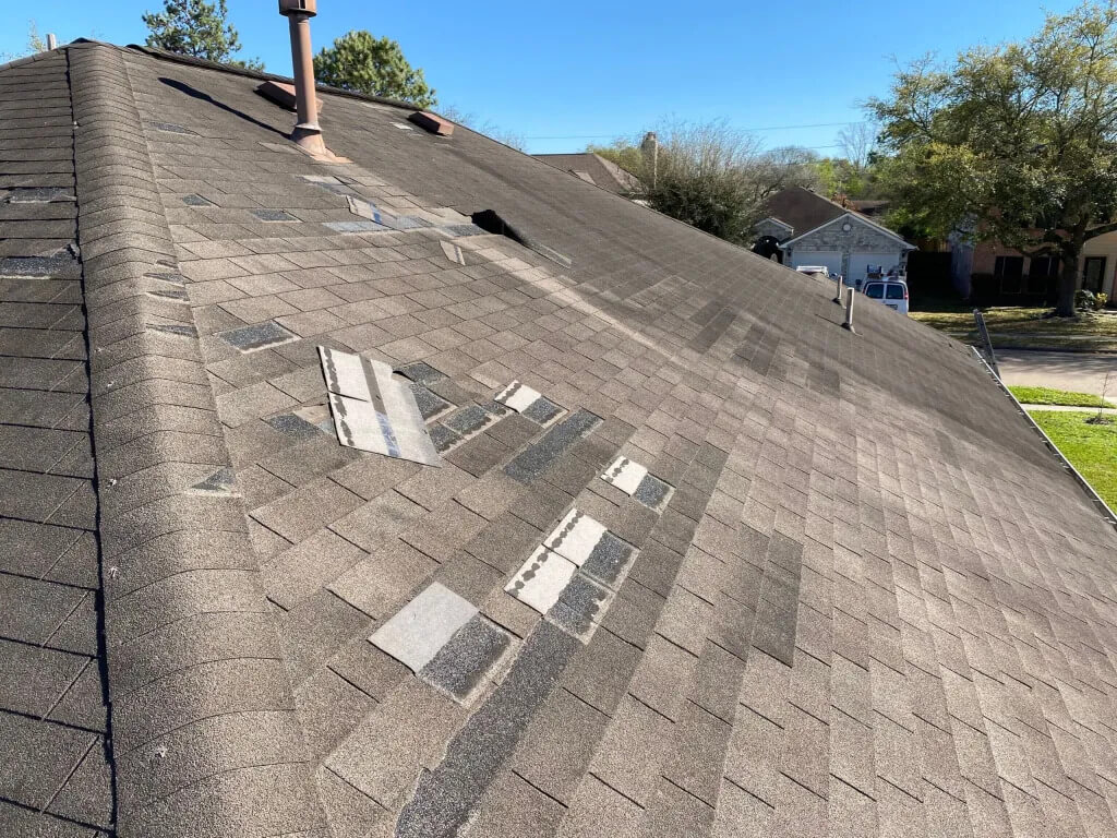 Missing Shingles and Exposed Underlayment