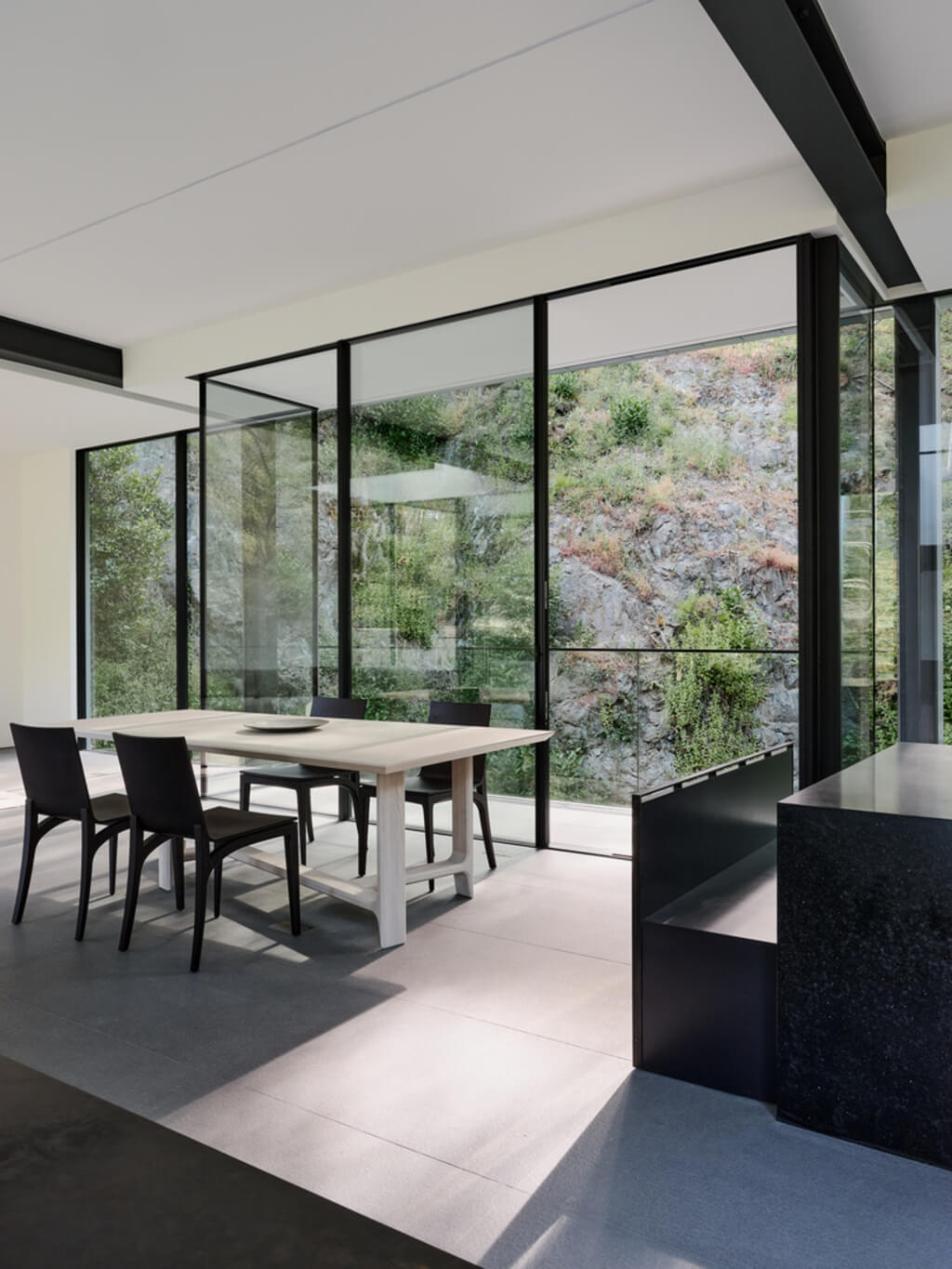 Suspension House dining room with a table and chairs
