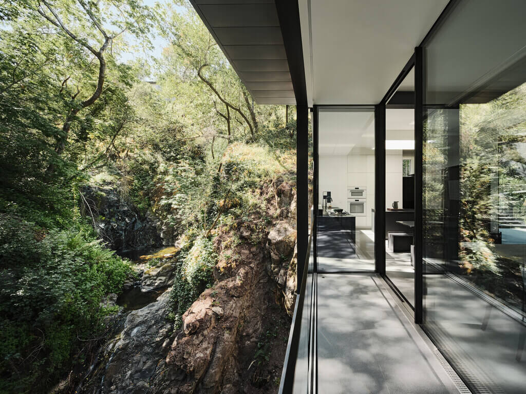 Suspension House with a view of a river
