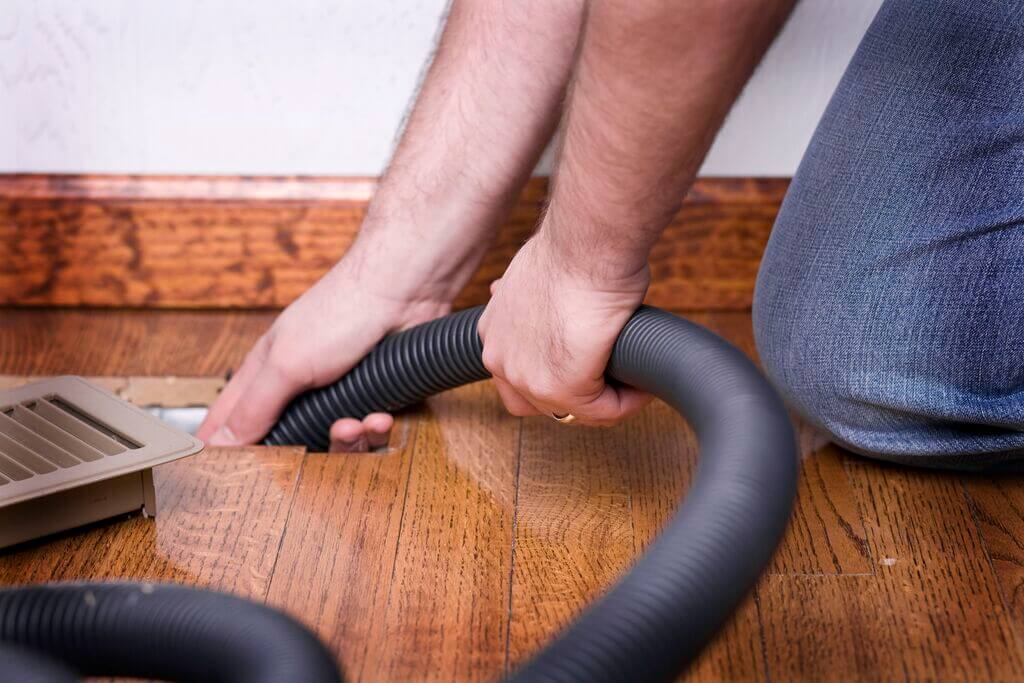 Use A Vacuum to Remove All the Dust and Particles from the Ducts