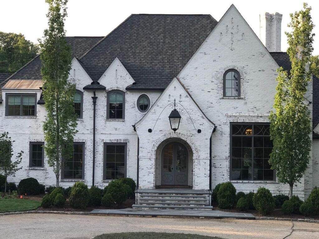 Patchy White Brick House Exterior