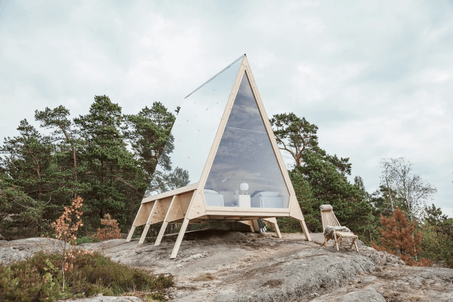 A-Frame House  structure on top of a mountain 