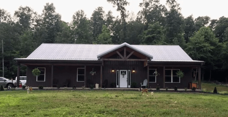 Black Barndominium with White Roof