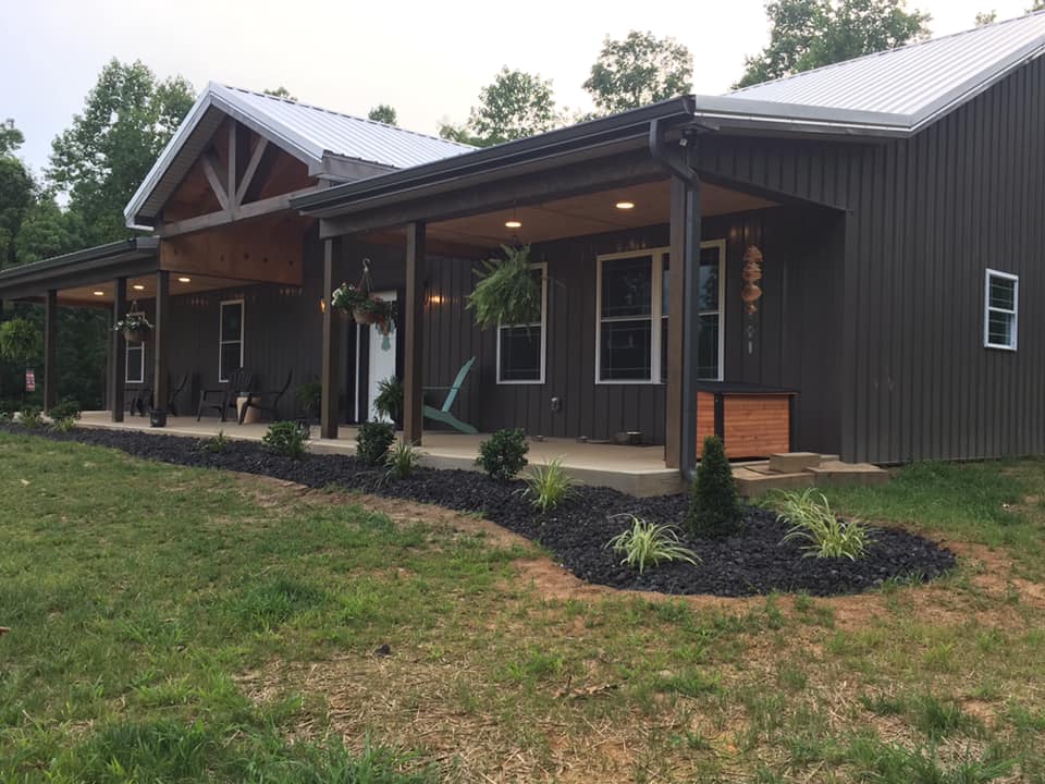 Black Barndominium with Wrap Around Porch