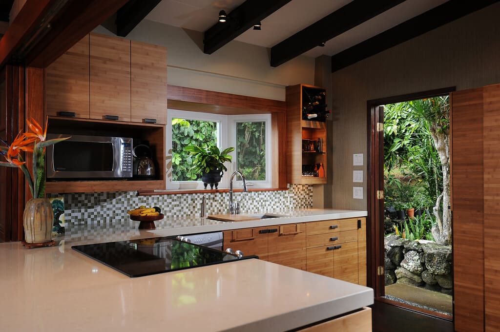 Kitchen With Woody Cabinets and White Countertop