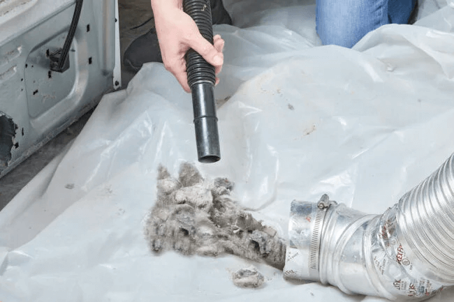 Clean up dust and debris from dryer vent